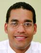 Young African American man smiling.