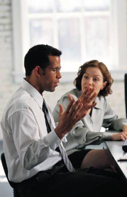 man and woman in discussion